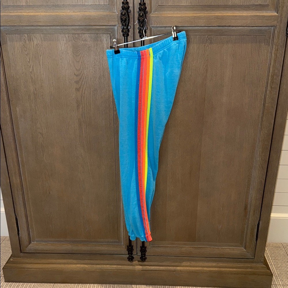Aviator Nation Blue Track Pants with Rainbow Stripe